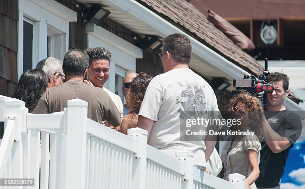 Paul "Pauly D" DelVecchio greets family members visiting on his birthday while filming on location for "Jersey Shore" on July 5, 2011 in Seaside...