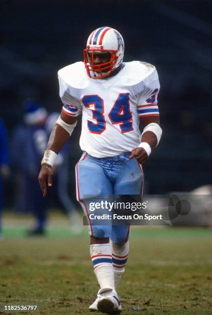 Running back Earl Campbell of the Houston Oilers looks on against the Baltimore Colts during an NFL game December 18, 1983 at Memorial Stadium in...