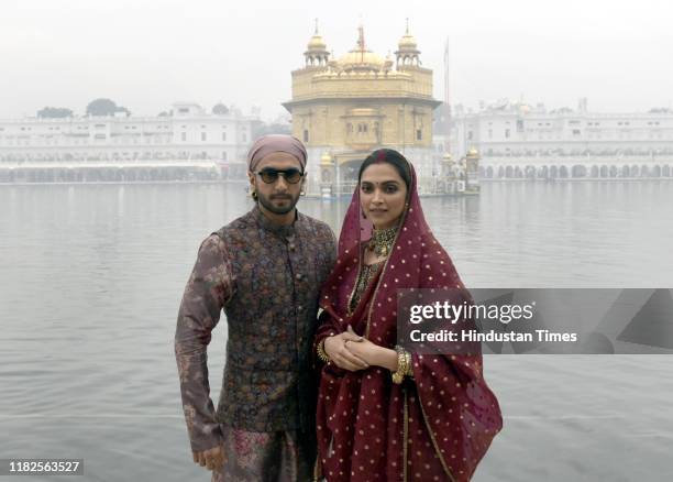 Bollywood actors Deepika Padukone and Ranveer Singh during their visit at Golden Temple on the occasion of their first wedding anniversary, on...