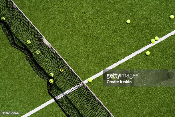 tennis balls on a field - wimbledon tennis stock pictures, royalty-free photos & images