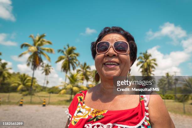 portrait of latin american lady - coconut beach woman stock pictures, royalty-free photos & images