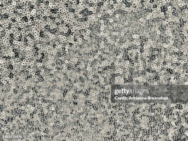 silver sequined fabric, full frame - silver sequins stock pictures, royalty-free photos & images