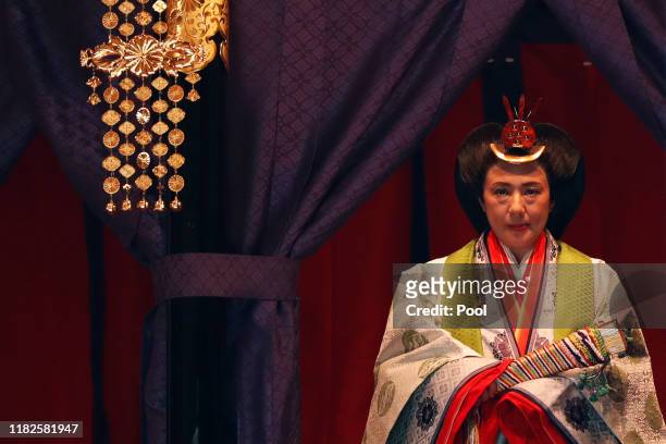 Japan's Empress Masako makes her appearance during a ceremony to proclaim Emperor Naruhito's enthronement to the world, called Sokuirei-Seiden-no-gi,...