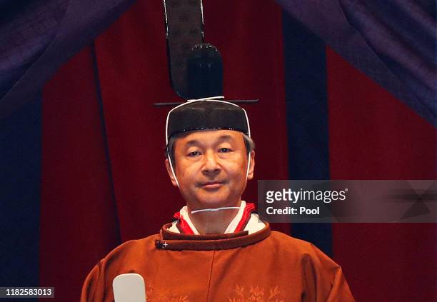 Japan's Emperor Naruhito makes his appearance during a ceremony to proclaim his enthronement to the world, called Sokuirei-Seiden-no-gi, at the...