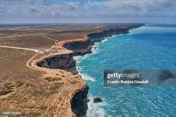 aerial view of the bunda cliffs - nullarbor plains, great australian bight marine park. - kangaroo island stock pictures, royalty-free photos & images