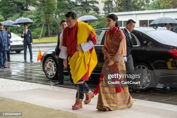 King Jigme Khesar Namgyel Wangchuck and Queen Jetsun Pema of Bhutan arrive to attend the Enthronement Ceremony Of Emperor Naruhito of Japan at the...