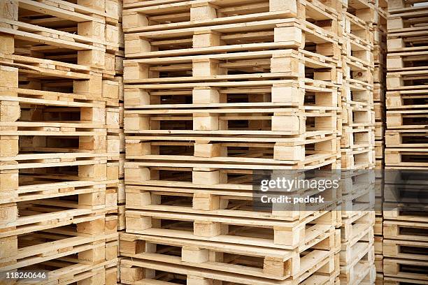 stacked pallets - palette stock pictures, royalty-free photos & images