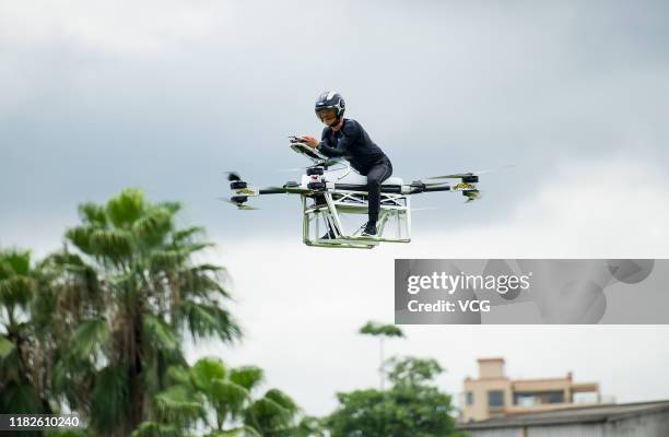 Zhao Deli rides his flying motorbike, named Jindouyun, or 'Magic Cloud', which was a flying cloud used by Monkey King, a character from the Chinese...