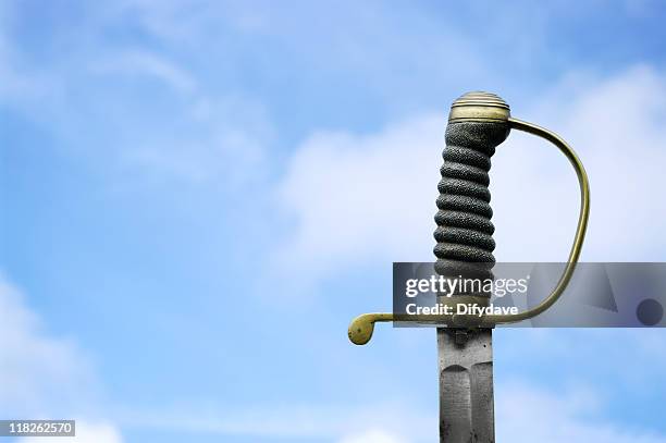 antique sabre against sky - sabres stock pictures, royalty-free photos & images