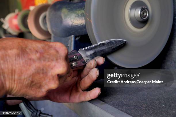 knife sharpening - sharpening stock pictures, royalty-free photos & images