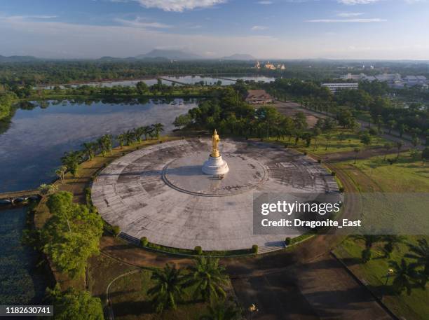 drone shot aerial view of buddha statue in chanthaburi thailand - chanthaburi province stock pictures, royalty-free photos & images