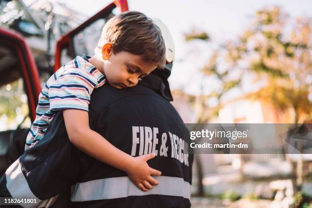 firefighter rescue operation - rescue services occupation imagens e fotografias de stock