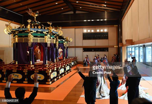 Japan's Prime Minister Shinzo Abe shouts banzai cheer for Emperor Naruhito and Empress Masako during the enthronement ceremony where emperor...