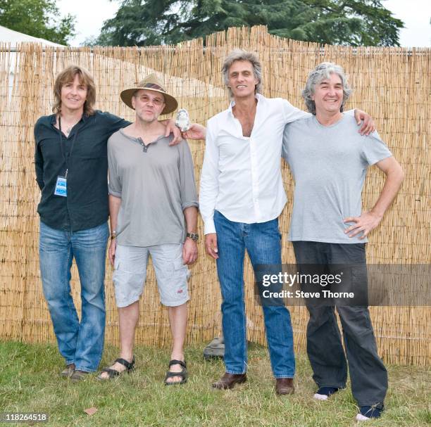 Terence Reis, Alan Clark, Chris White and Phil Palmer of The Straits pose backstage during the third day of Cornbury Festival on July 3, 2011 in...