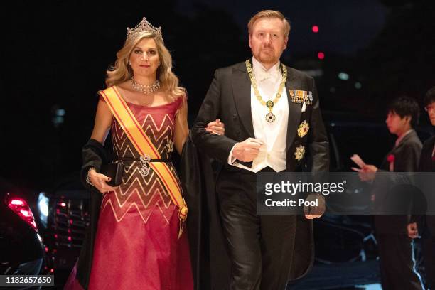 King Willem Alexander of the Netherlands and his wife Queen Maxima of the Netherlands arrive at the Imperial Palace for the Court Banquets after the...