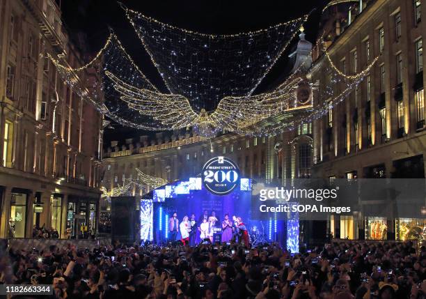 Regent Street illuminated with Christmas lights during the Regent Street Christmas lights switch on in London.