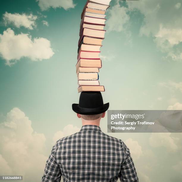 Stackinghat Book Hats Stacked Up Photos and Premium High Res Pictures - Getty Images