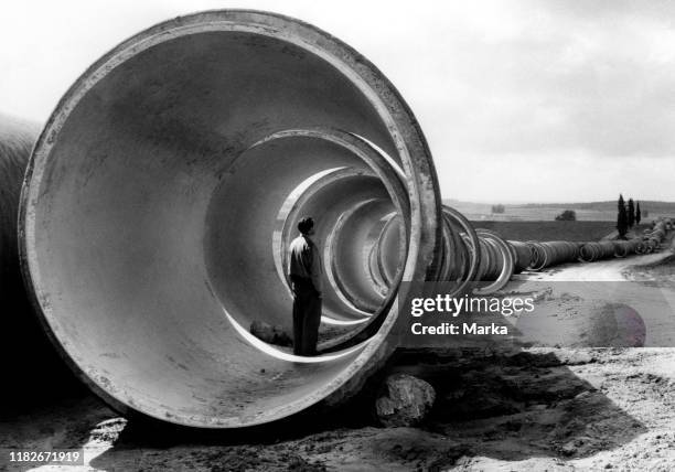 Middle East, Israel, pipes of the Jordanian-Negev Aqueduct near Kfar Saba, 1963.