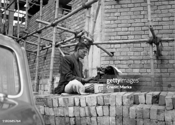 Asia, india, calcutta, public scribe, 1964.