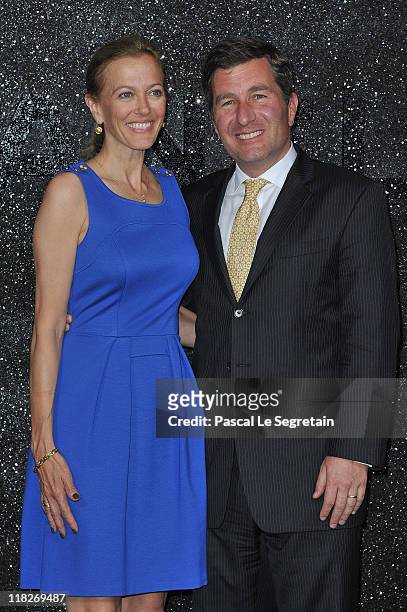 United States Ambassador to France and Monaco Charles H. Rivkin and his Wife Susan M. Tolson attend the Chanel Haute Couture Fall/Winter 2011/2012...