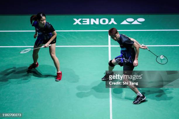 Goh Soon Huat and Lai Shevon Jemie of Malaysia compete in the Mixed Doubles first round match against Zheng Siwei and Huang Yaqiong of China on day...