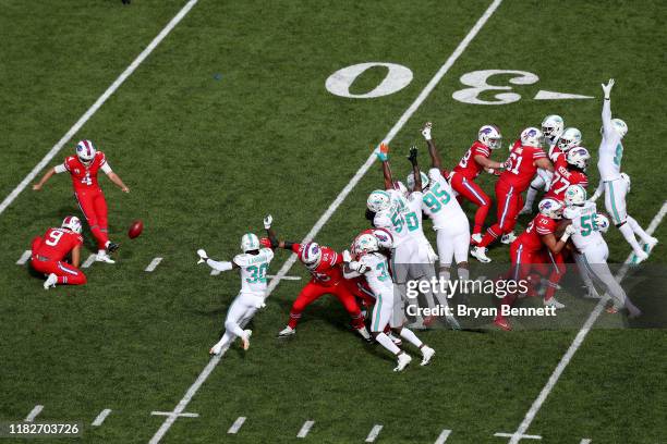 Stephen Hauschka of the Buffalo Bills kicks a field goal during the first quarter of an NFL game against the Miami Dolphins at New Era Field on...