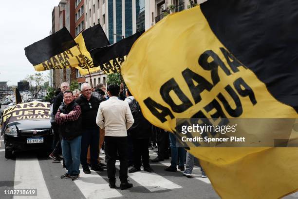 Taxi drivers participate in a strike over pay and competition from Uber on October 22, 2019 in Buenos Aires, Argentina. Argentina, a nation rocked by...
