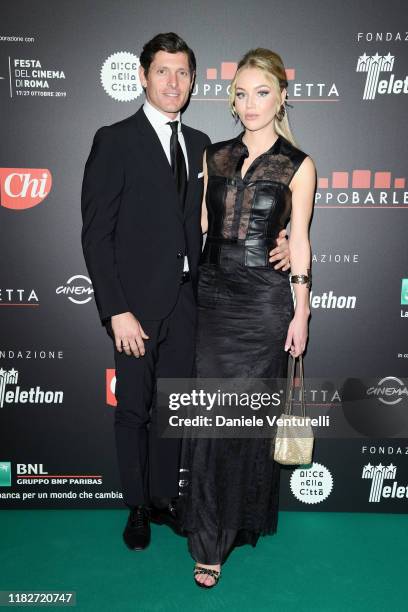 Aldo Montano and Olga Plachina attend the Telethon dinner during the 14th Rome Film Festival on October 22, 2019 in Rome, Italy.