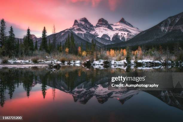 three sisters mountains, canmore , alberta, canada - canmore alberta stock pictures, royalty-free photos & images