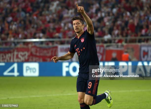 Robert Lewandowski of FC Bayern Munich celebrates after scoring his team's first goal during the UEFA Champions League group B match between...