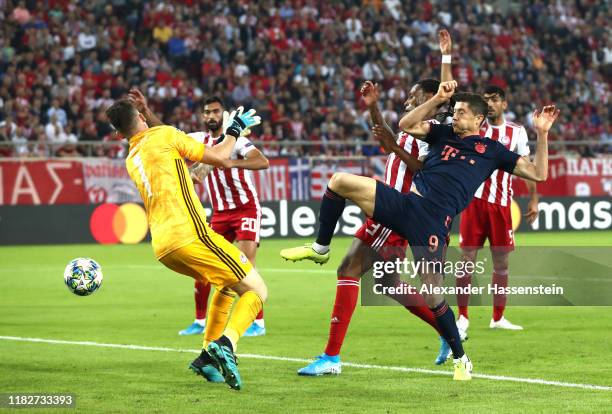 Robert Lewandowski of FC Bayern Munich scores his team's second goal during the UEFA Champions League group B match between Olympiacos FC and Bayern...