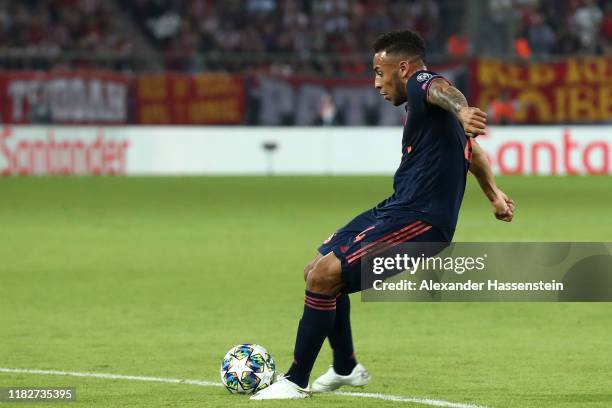 Corentin Tolisso of FC Bayern Munich scores his team's third goal during the UEFA Champions League group B match between Olympiacos FC and Bayern...