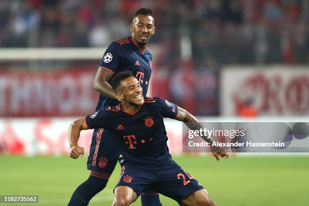 Corentin Tolisso of FC Bayern Munich celebrates after scoring his team's third goal during the UEFA Champions League group B match between Olympiacos...