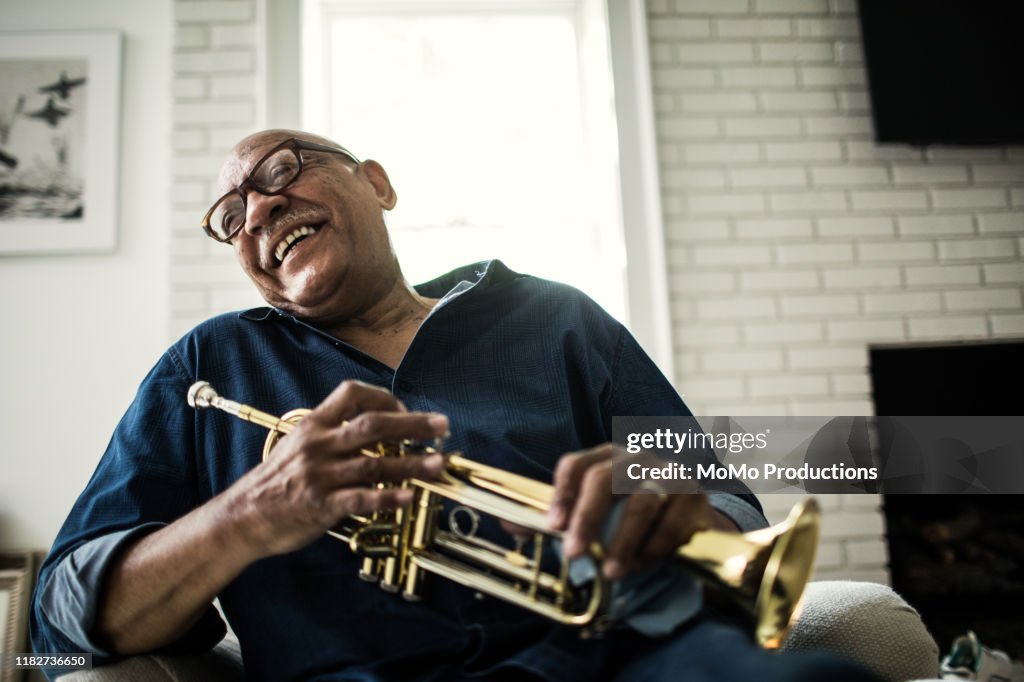 Portrait of senior man with trumpet