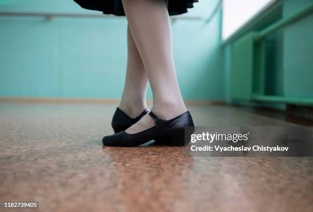 feet of ballet dancer wearing black shoes - stockings feet stock pictures, royalty-free photos & images