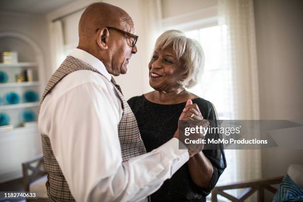 seniors - old couple holding hands stock pictures, royalty-free photos & images