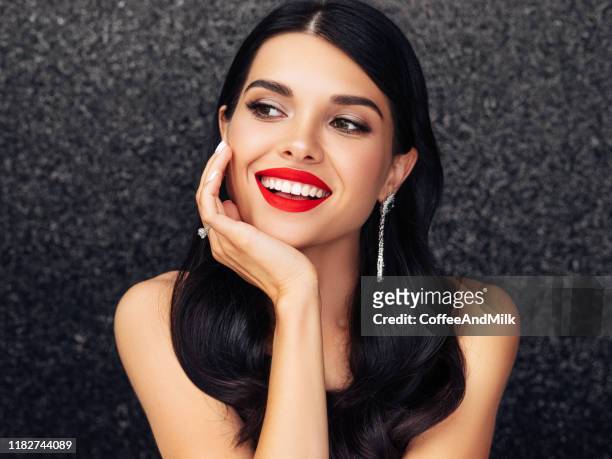 beautiful lady with elegant hairstyle - red lips stock pictures, royalty-free photos & images