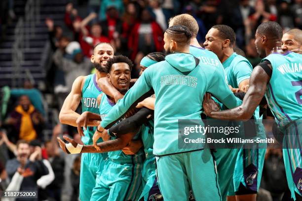 The Charlotte Hornets celebrate a game winning shot by Malik Monk of the Charlotte Hornets after a game against the Detroit Pistons on November 15,...