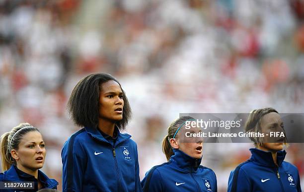 Wendie Renard of France stands tall in the line up for the Anthems during the FIFA Women's World Cup 2011 Group A match between France and Germany at...