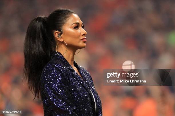 American singer-songwriter Nicole Scherzinger performs the national anthem prior to Game One of the 2019 World Series between the Houston Astros and...