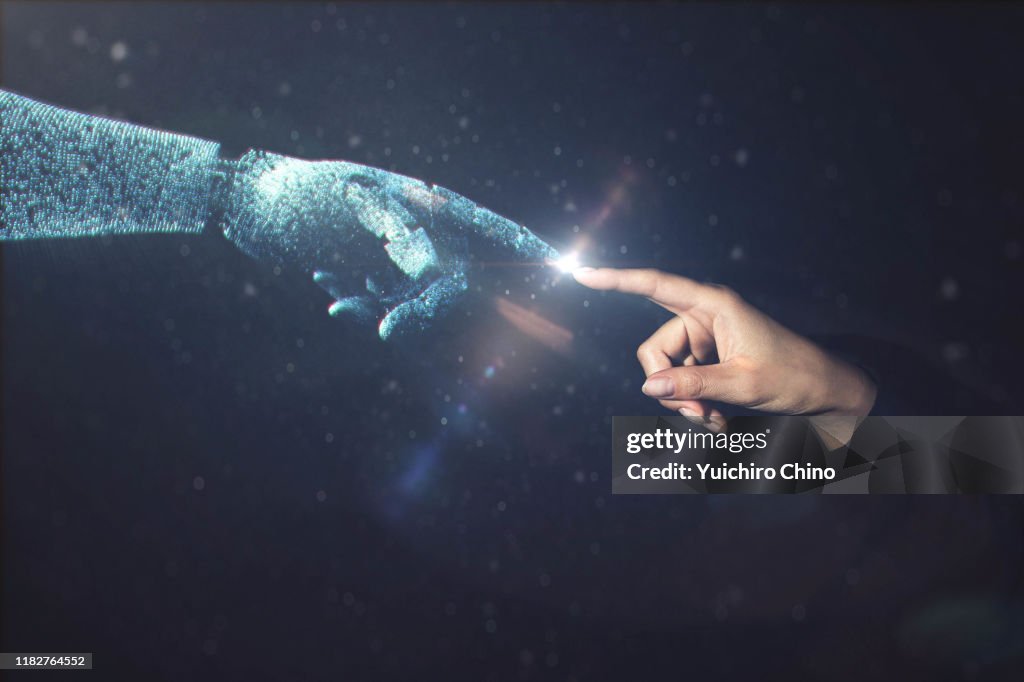 Artificial intelligence robot finger touching to human finger
