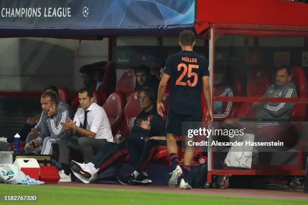 Thomas Müller of FC Bayern München walks back to the team bench during the UEFA Champions League group B match between Olympiacos FC and Bayern...