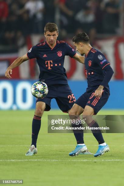 Thomas Müller and Philippe Coutinho of FC Bayern Munich in action during the UEFA Champions League group B match between Olympiacos FC and Bayern...