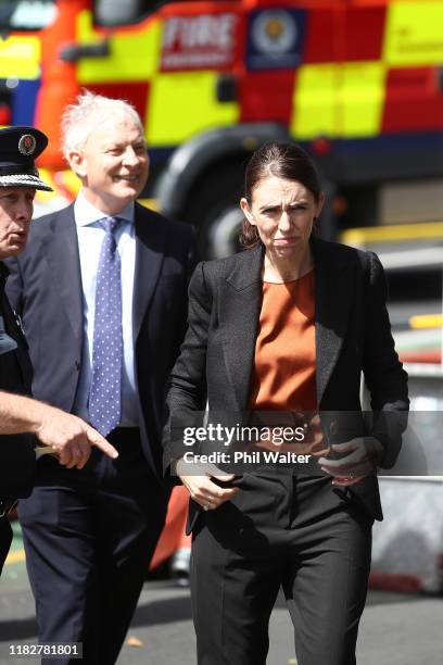 Prime Minister Jacinda Ardern and Auckland Mayor Phil Goff meet with firefighters and saftey officials outside the SkyCity Convention Centre on...