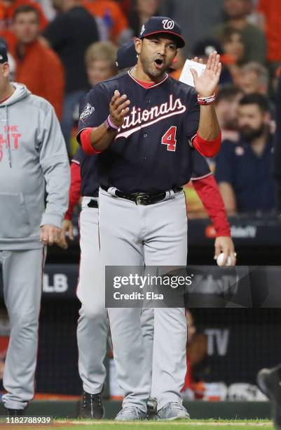 Manager Dave Martinez of the Washington Nationals celebrates his teams 5-4 win over the Houston Astros in Game One of the 2019 World Series at Minute...