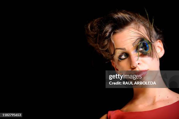 Model presents a creation by Colombian designer Claudia Gomez during the Colombiamoda fashion show on July 29 in Medellin, Antioquia department,...