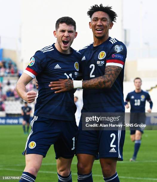 Ryan Christie celebrates with his teammate Liam Palmer after making it 1-0 to Scotland during the UEFA European qualifier between Cyprus and...