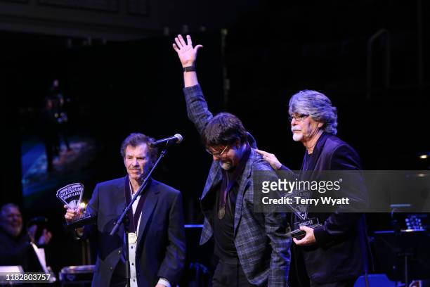 Inductees Jeff Cook, Randy Owen and Teddy Gentry of Alabama speak onstage during the 2019 Musicians Hall of Fame Induction Ceremony & Concert at...