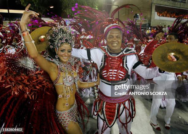 Carol Castro, Queen of the Drums of the Academicos do Salgueiro samba school performs with the "Master of the Drums" during the opening night of Rio...