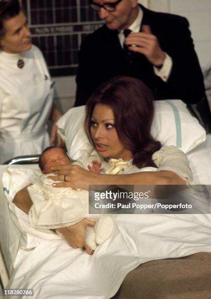 Italian actress Sophia Loren with her new baby boy, circa 1970.